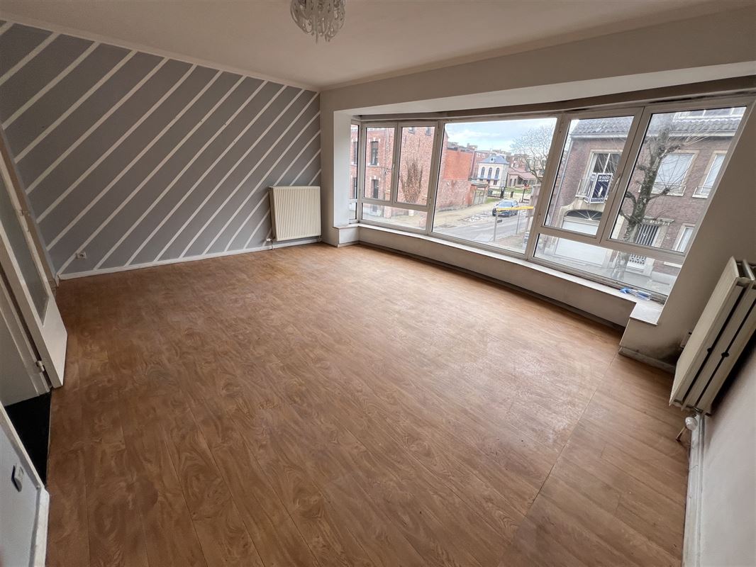 Opbrengsteigendom met 4 appartementen en tuin