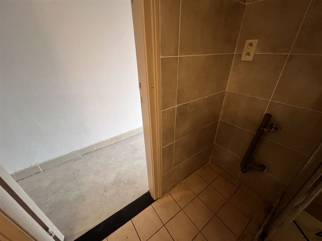 Opbrengsteigendom met 4 appartementen en tuin