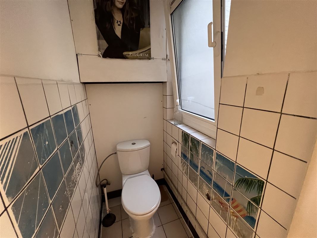 Opbrengsteigendom met 4 appartementen en tuin