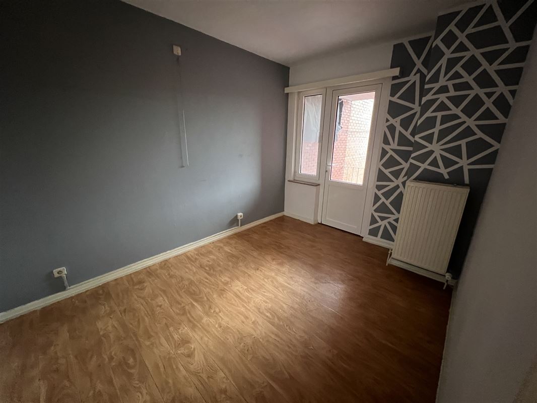 Opbrengsteigendom met 4 appartementen en tuin