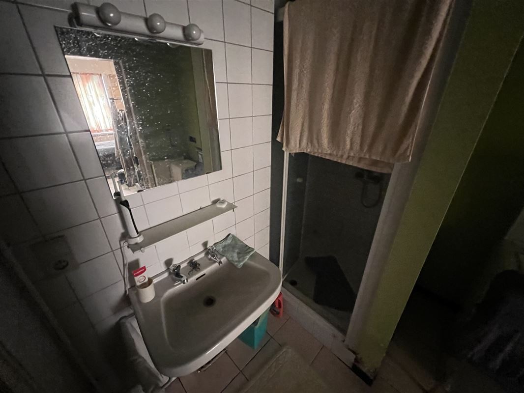Opbrengsteigendom met 4 appartementen en tuin