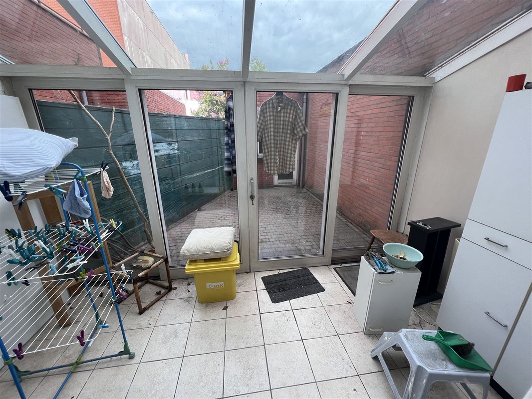 Opbrengsteigendom met 4 appartementen en tuin