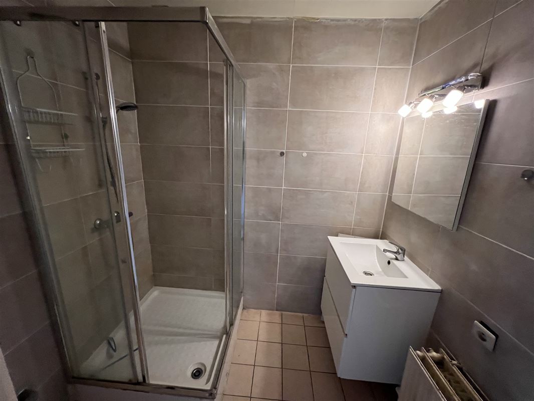 Opbrengsteigendom met 4 appartementen en tuin