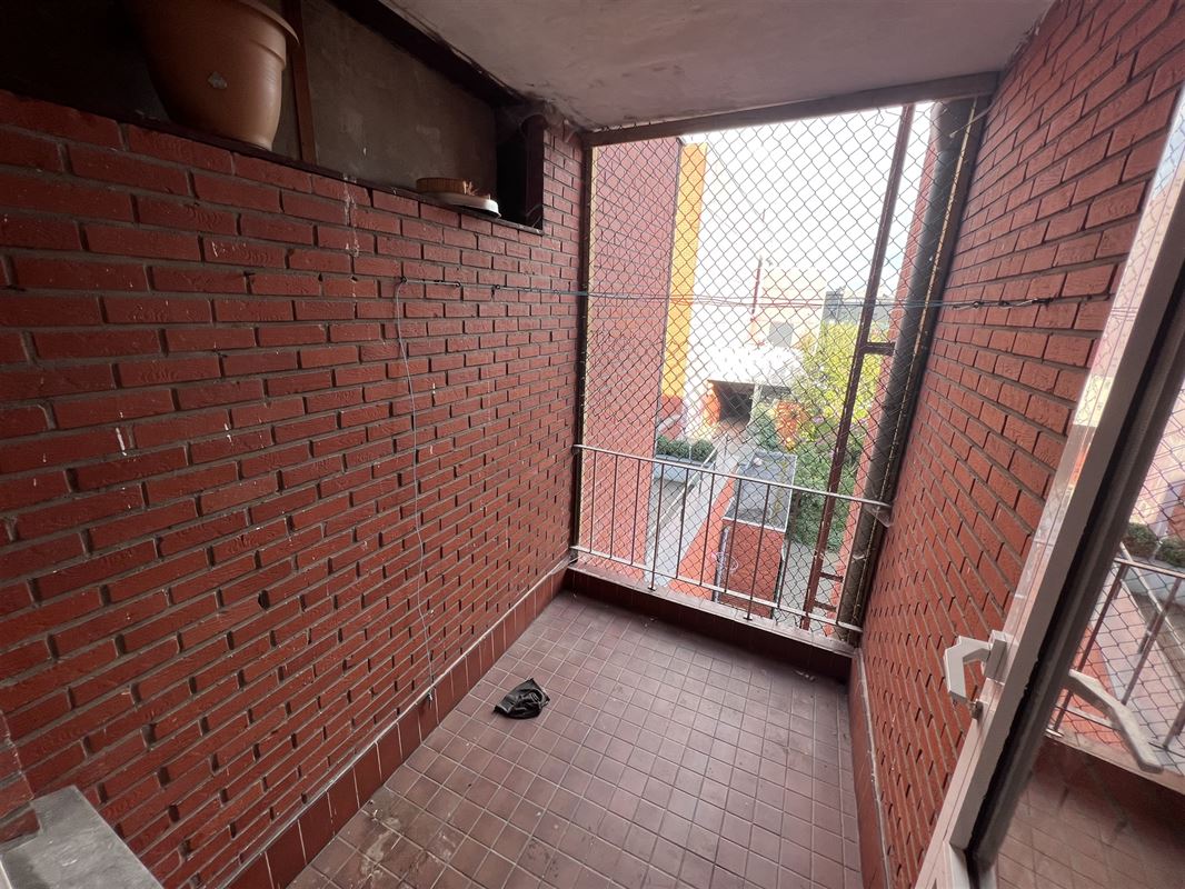 Opbrengsteigendom met 4 appartementen en tuin