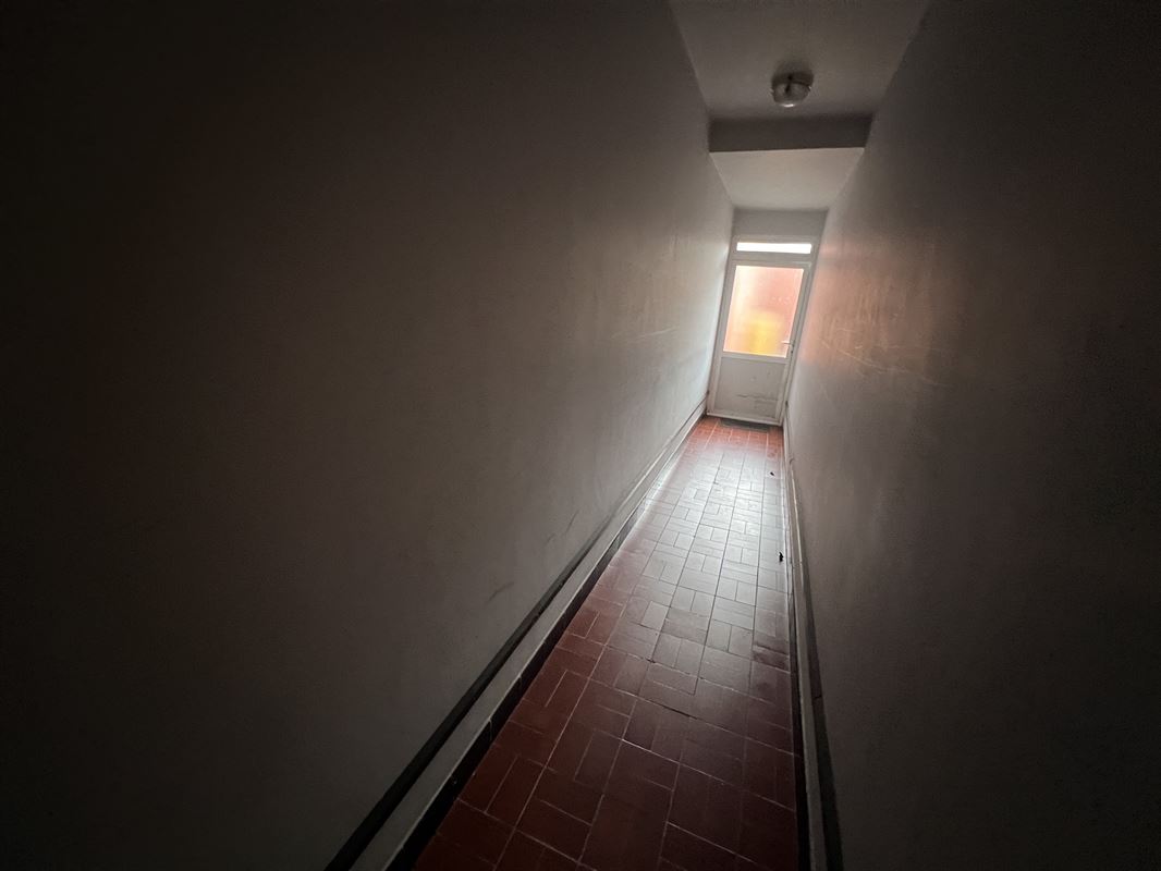 Opbrengsteigendom met 4 appartementen en tuin