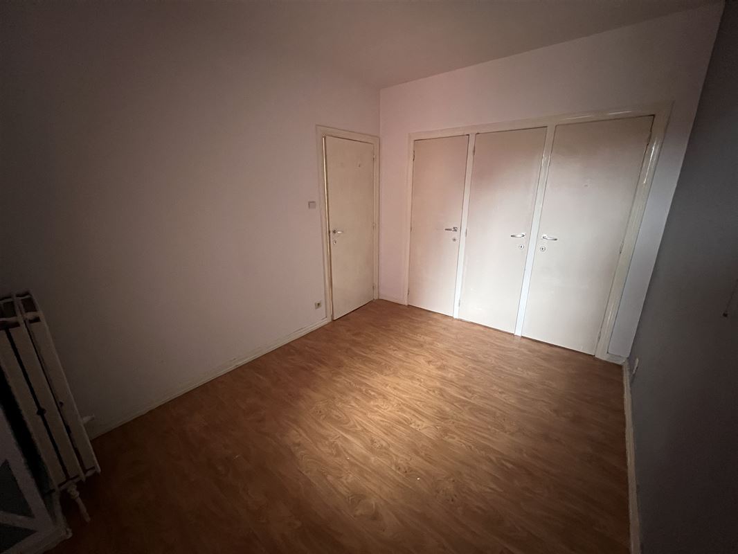 Opbrengsteigendom met 4 appartementen en tuin