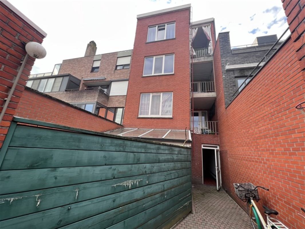 Opbrengsteigendom met 4 appartementen en tuin