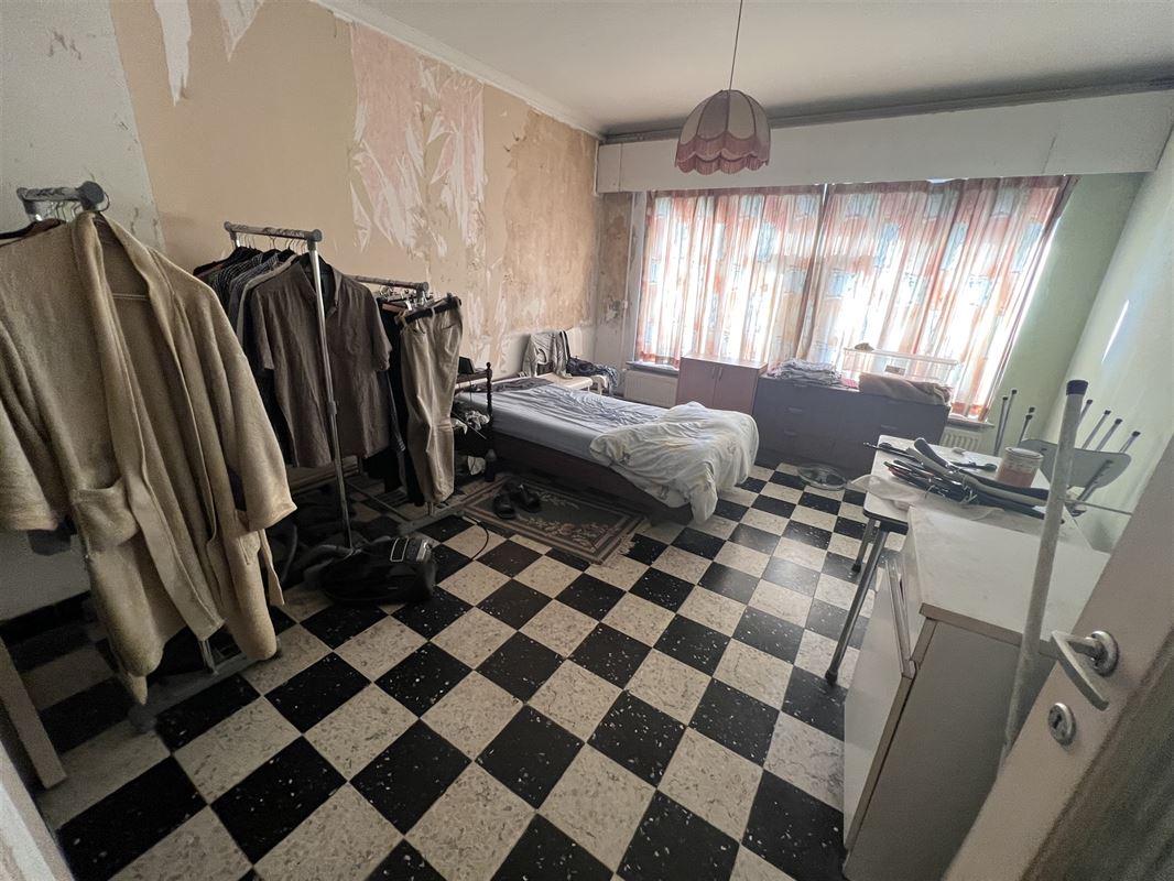 Opbrengsteigendom met 4 appartementen en tuin