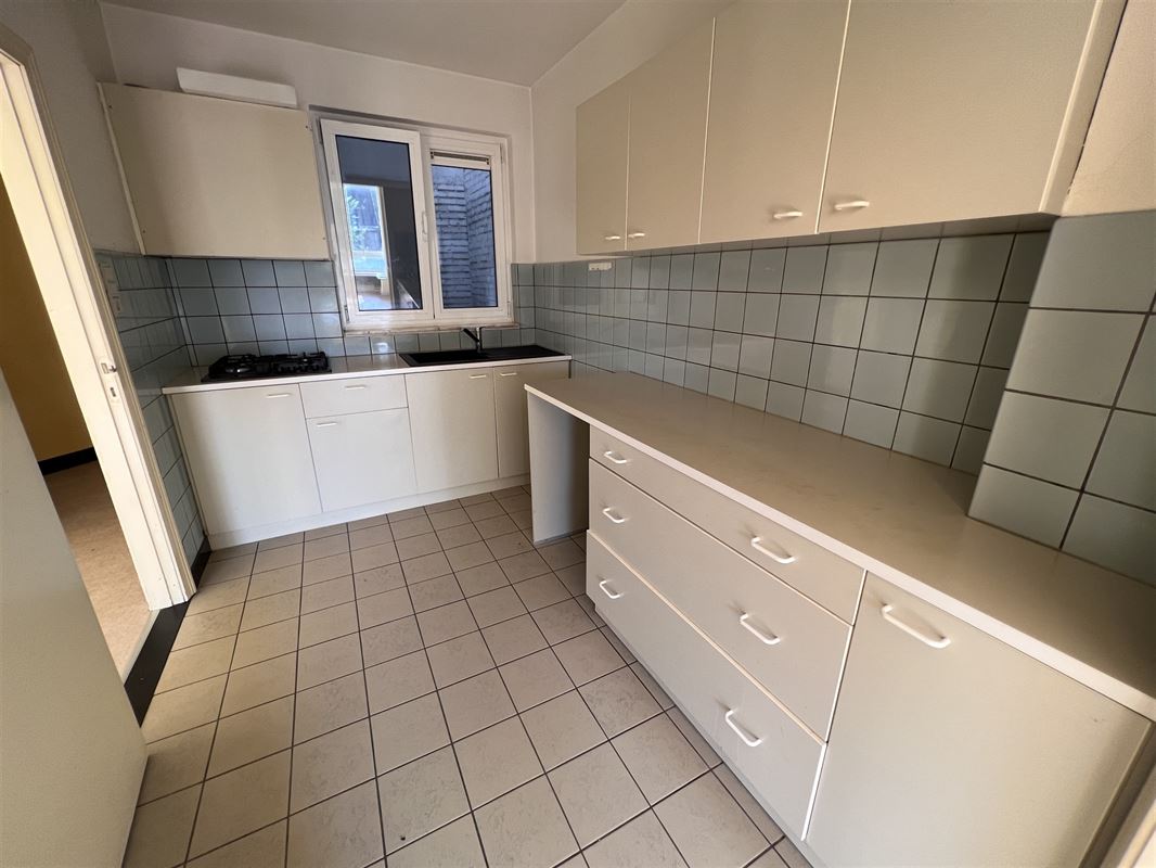 Opbrengsteigendom met 4 appartementen en tuin