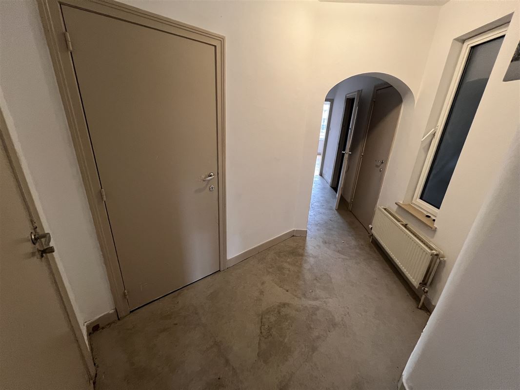 Opbrengsteigendom met 4 appartementen en tuin