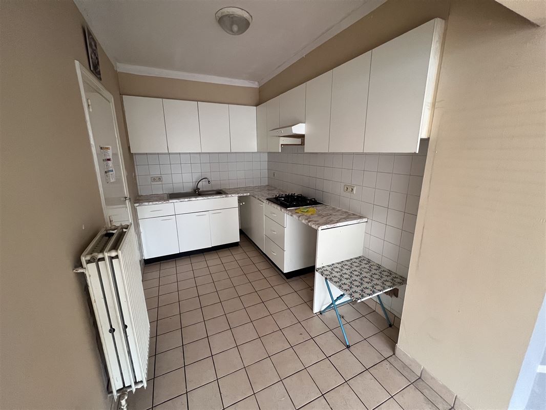 Opbrengsteigendom met 4 appartementen en tuin