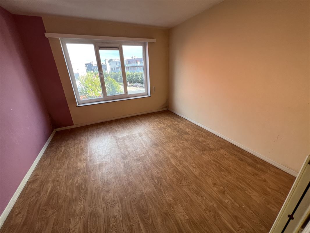 Opbrengsteigendom met 4 appartementen en tuin