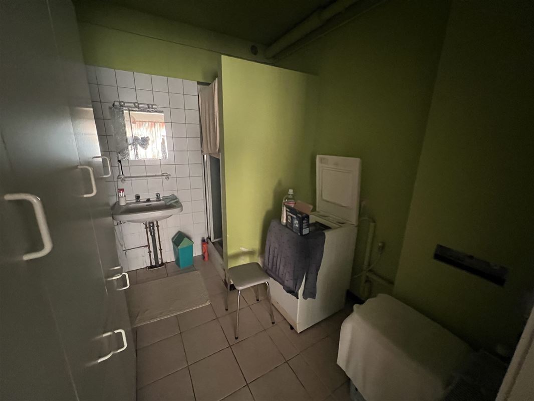 Opbrengsteigendom met 4 appartementen en tuin