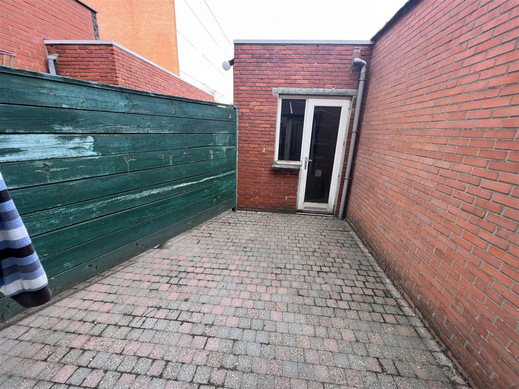 Opbrengsteigendom met 4 appartementen en tuin