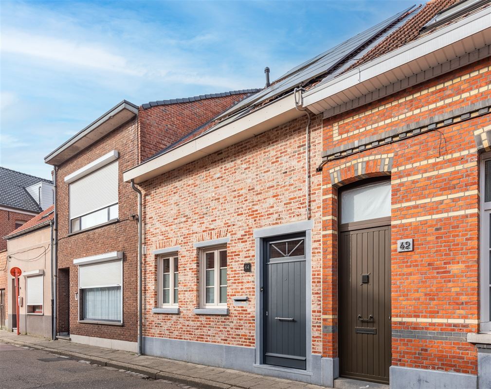 Kwaliteitsvol instapklaar huis met 3 slpks, 2 badks en tuin