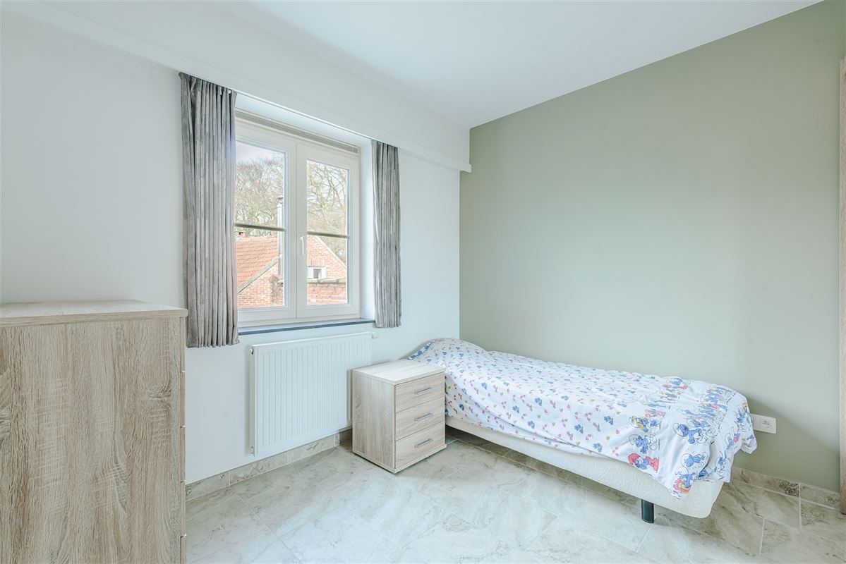 Kwaliteitsvol instapklaar huis met 3 slpks, 2 badks en tuin