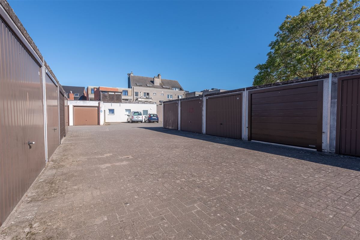 Fris triplex appartement met groot dakterras en garage