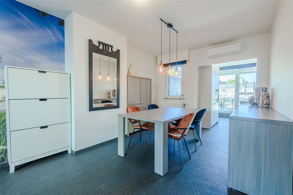 Fris triplex appartement met groot dakterras en garage