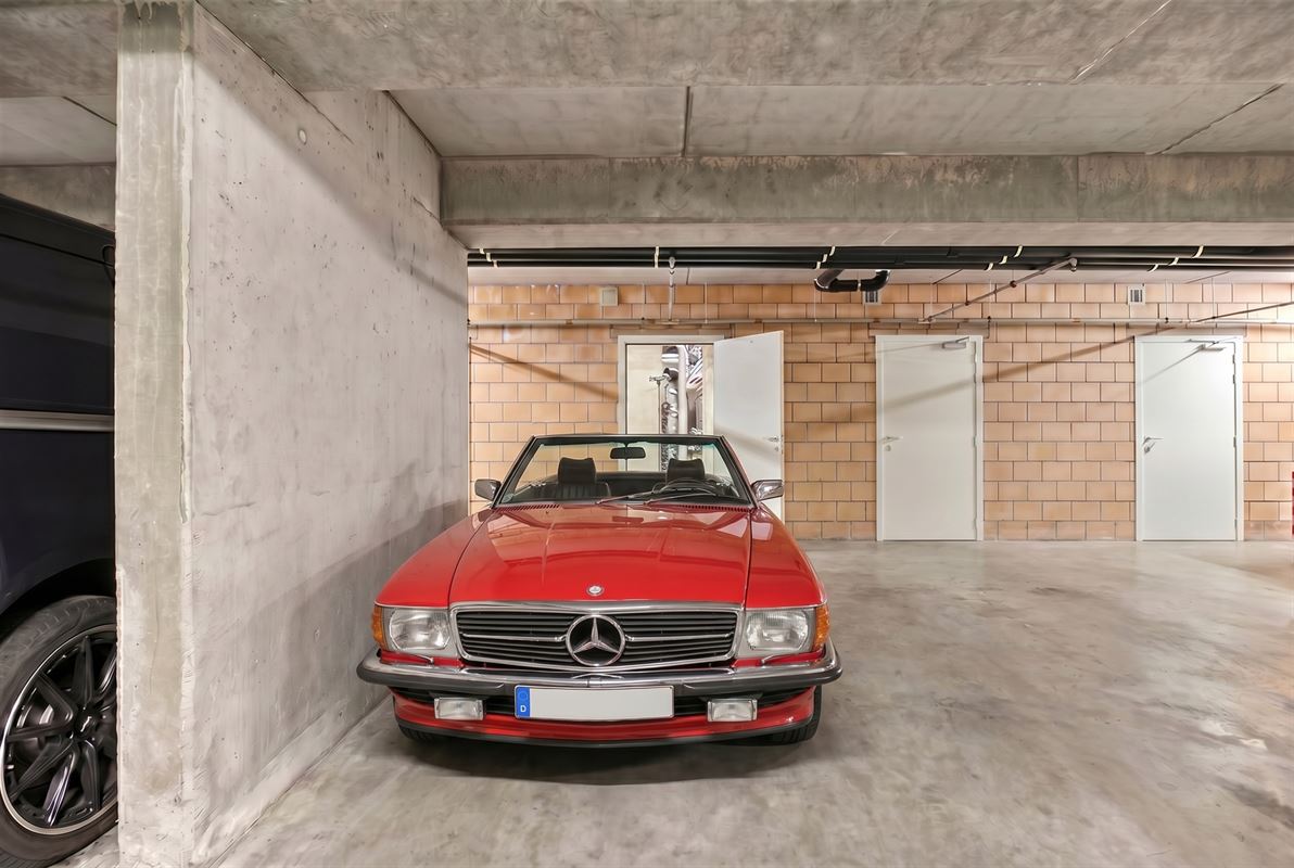 Instapklaar gelijkvloers appartement met tuin en parking