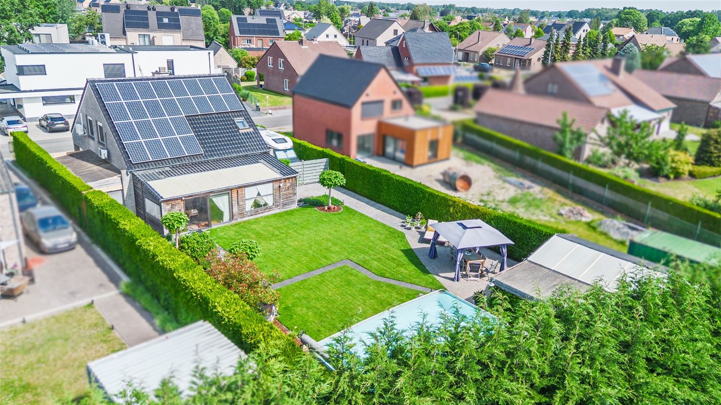Vrijstaande woning op 763 m² met veranda en zonnige tuin