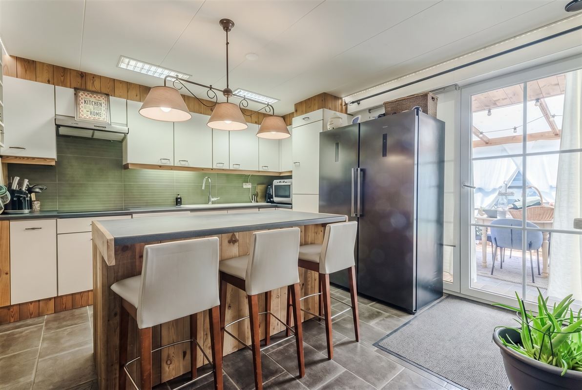 Vrijstaande woning op 763 m² met veranda en zonnige tuin