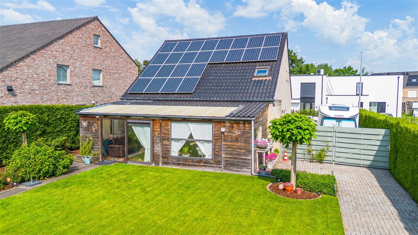 Vrijstaande woning op 763 m² met veranda en zonnige tuin