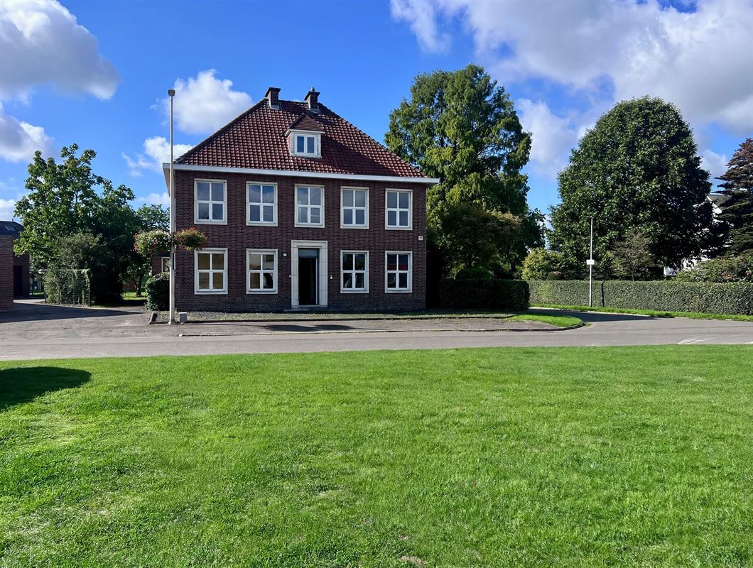 Karaktervolle woning met ruime tuin en renovatiepotentieel