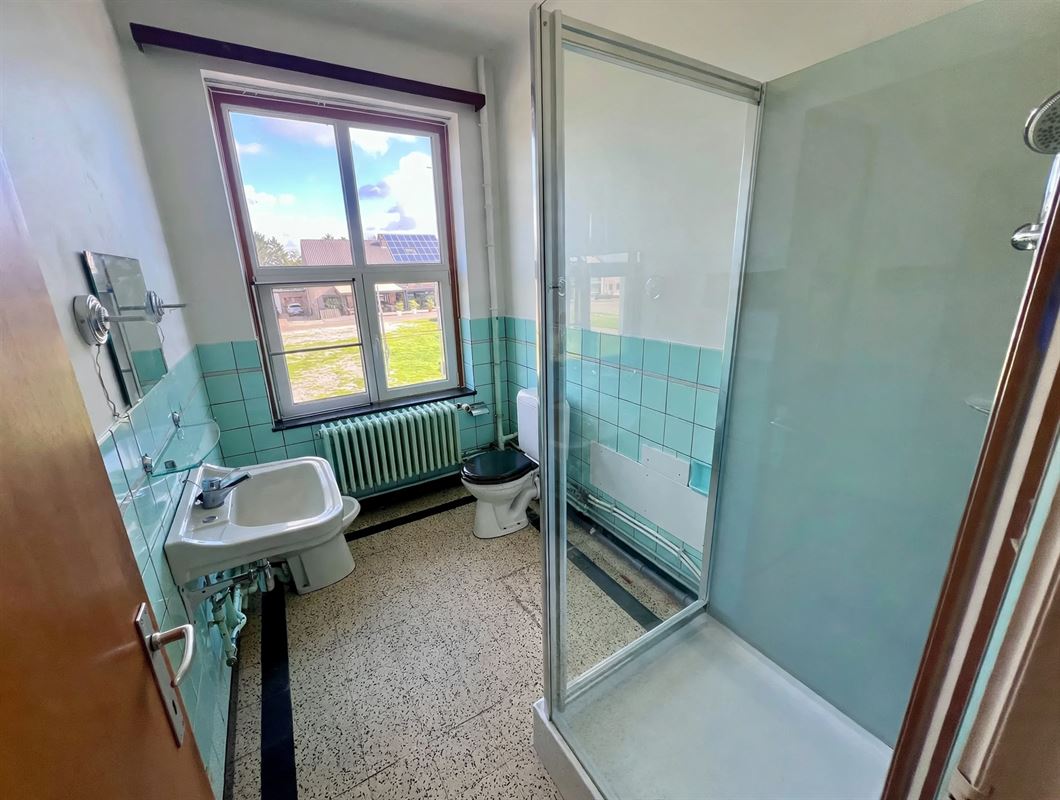 Karaktervolle woning met ruime tuin en renovatiepotentieel