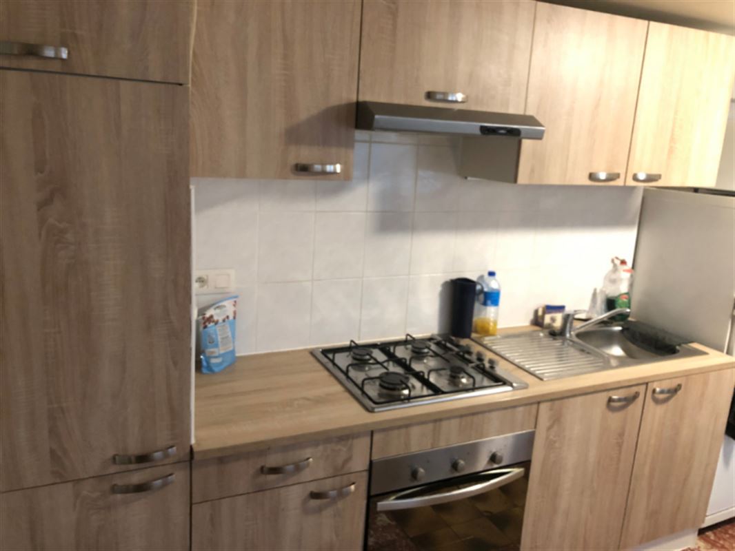 Half open woning met garage