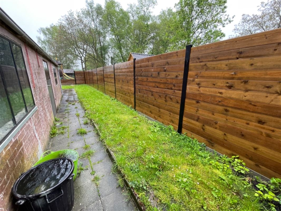 Half open woning met garage