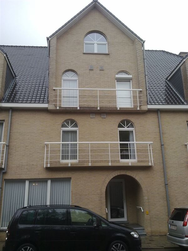 Appartement met terras en garage