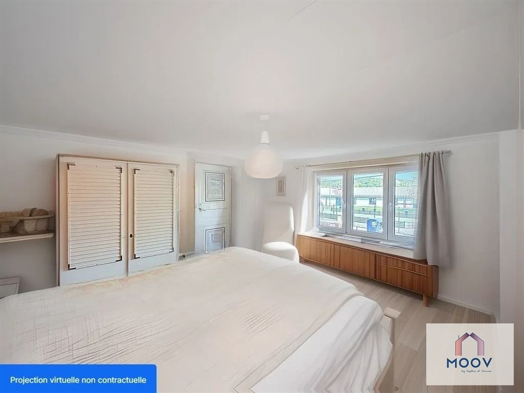 Maison aux beaux volumes, idéalement située dans un quartier calme.