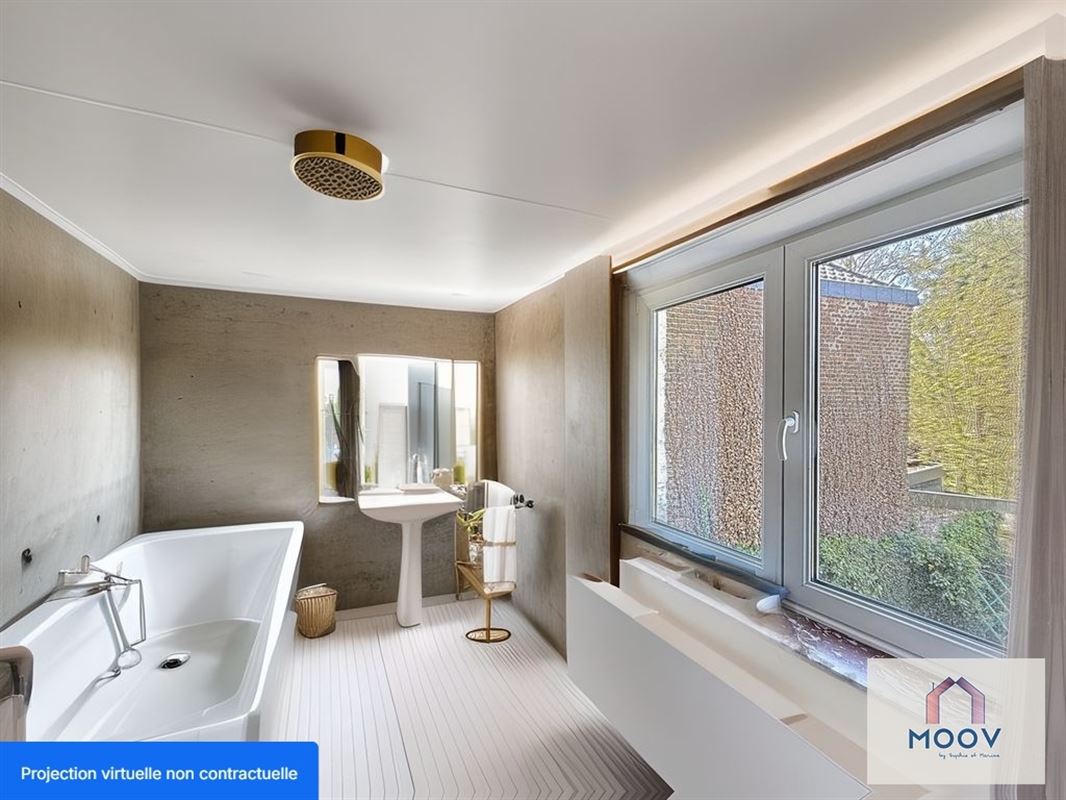 Maison aux beaux volumes, idéalement située dans un quartier calme.