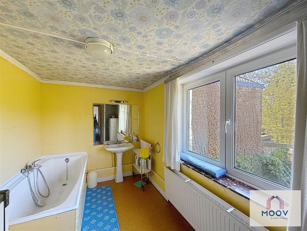 Maison aux beaux volumes, idéalement située dans un quartier calme.