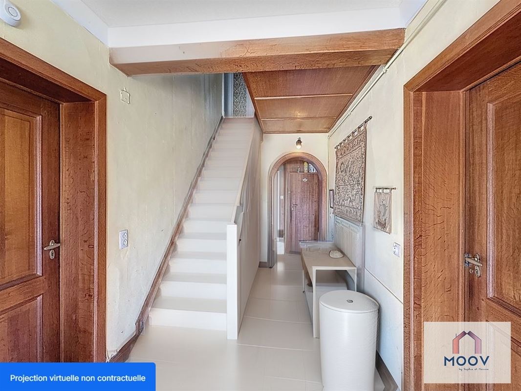 Maison aux beaux volumes, idéalement située dans un quartier calme.