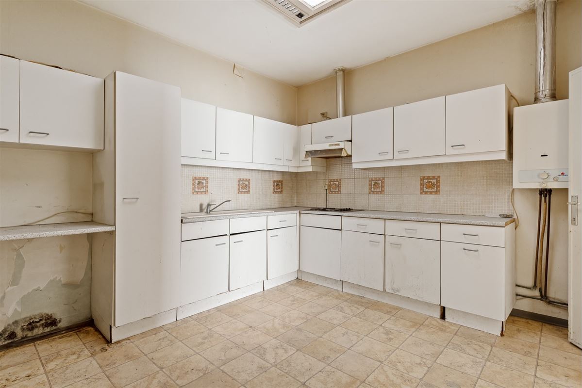 Te renoveren woning met 5 slaapkamers in het centrum