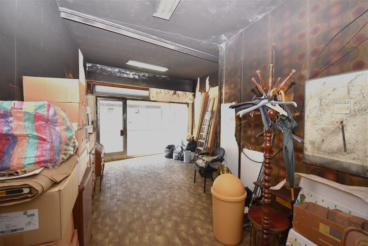 Ruim handelspand met woonst en garage(s) in het centrum van Lier