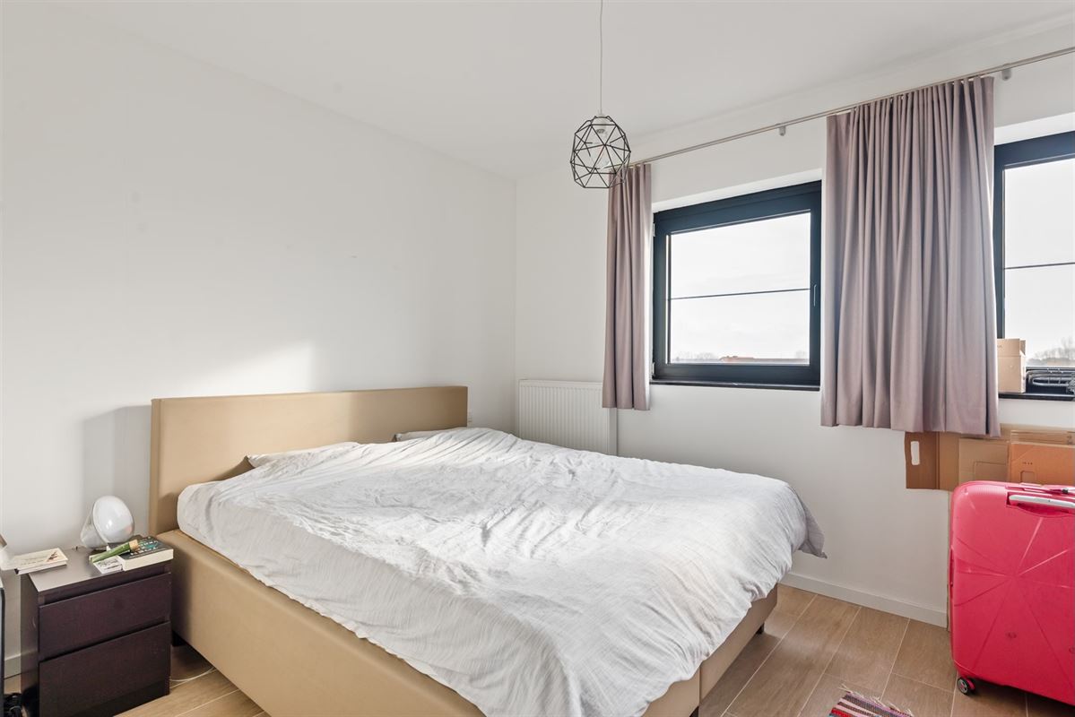 Appartement met 2 slaapkamers, ruim terras + autostaanplaats