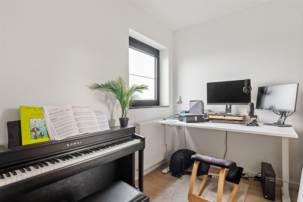 Appartement met 2 slaapkamers, ruim terras + autostaanplaats