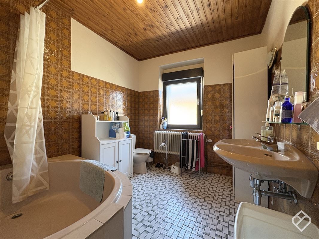 Maison avec rez-commercial