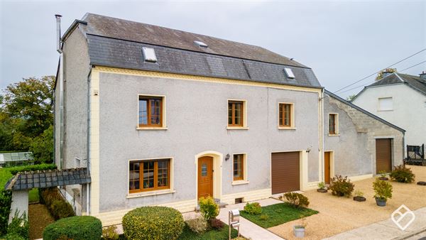 Maison familiale spacieuse avec grand garage