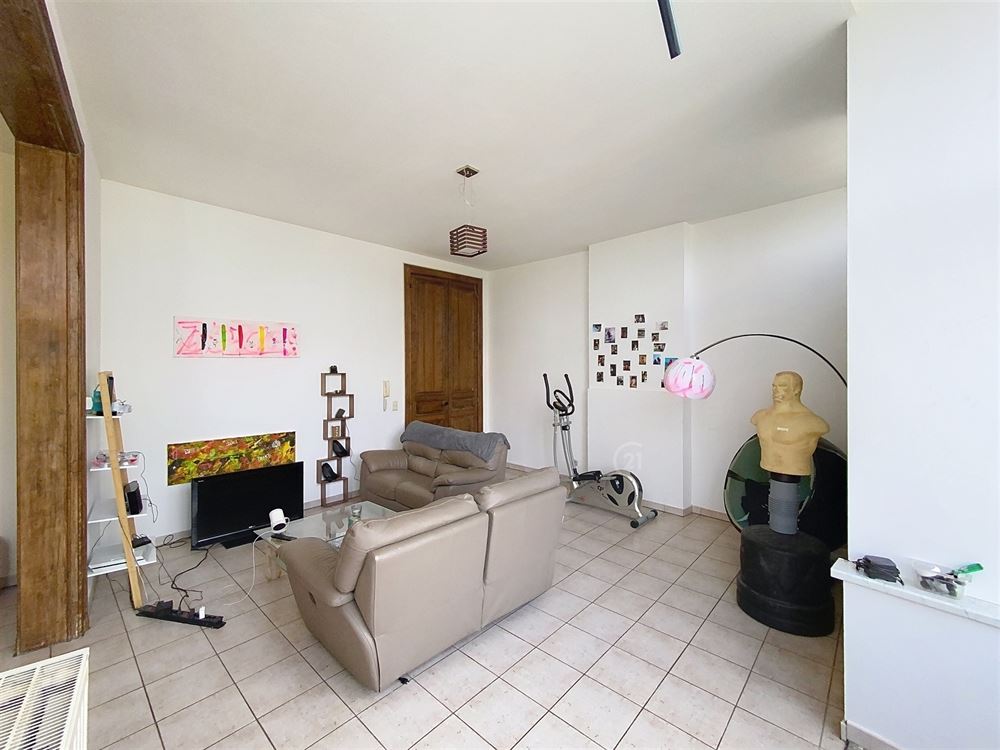 IMMEUBLE DE RAPPORT SUR LA PLACE DE METTET