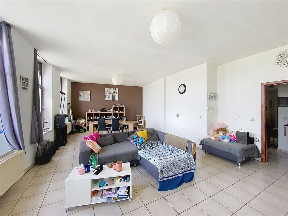 IMMEUBLE DE RAPPORT SUR LA PLACE DE METTET