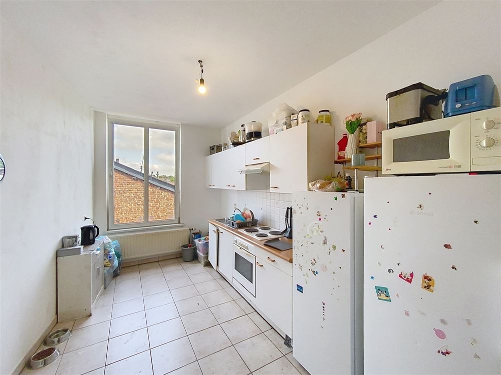 IMMEUBLE DE RAPPORT SUR LA PLACE DE METTET