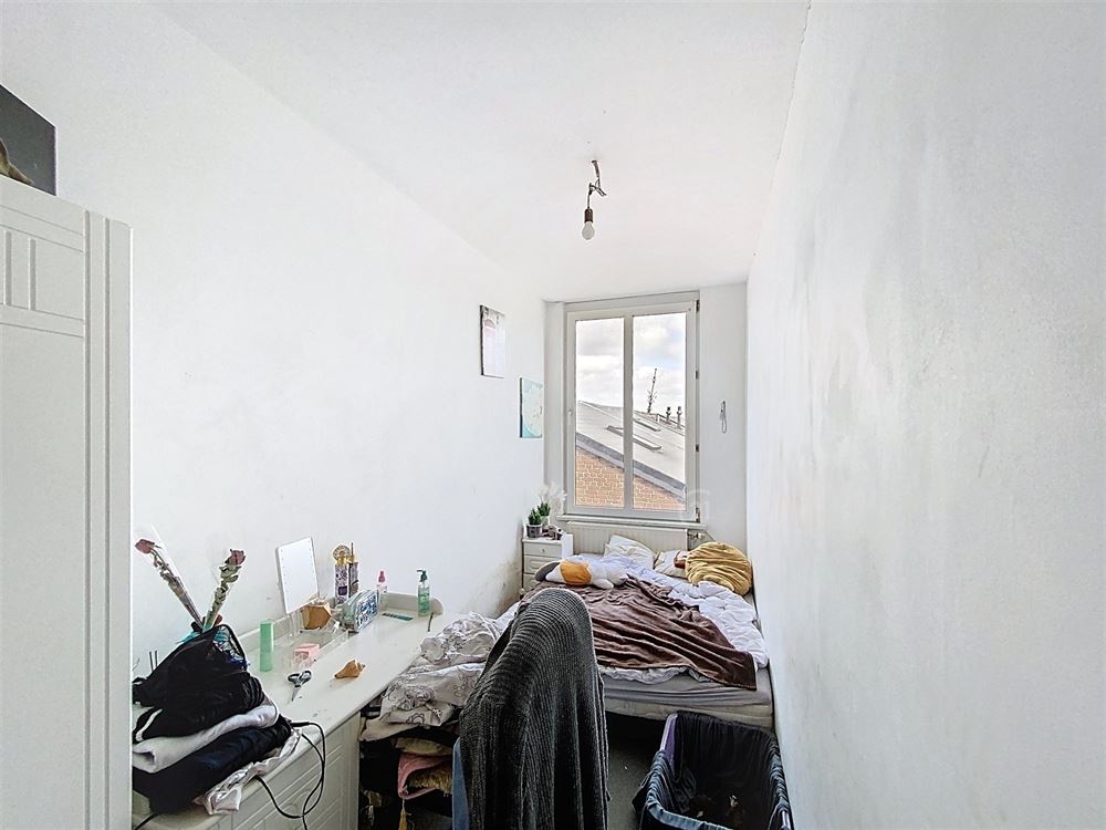 IMMEUBLE DE RAPPORT SUR LA PLACE DE METTET