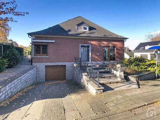 MAISON AVEC SURFACE COMMERCIALE 4 CHAMBRES ET 3 BU