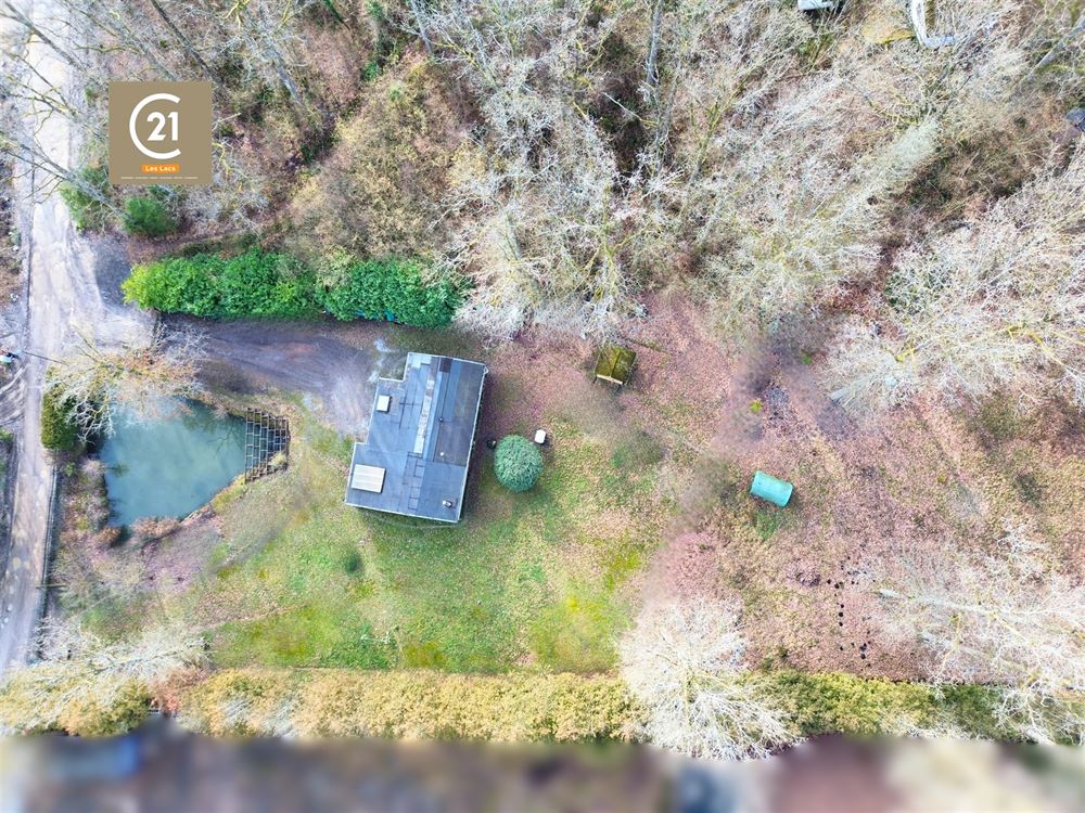 SUPERBE CHALET AVEC ÉTANG SITUÉ EN PLEINE NATURE