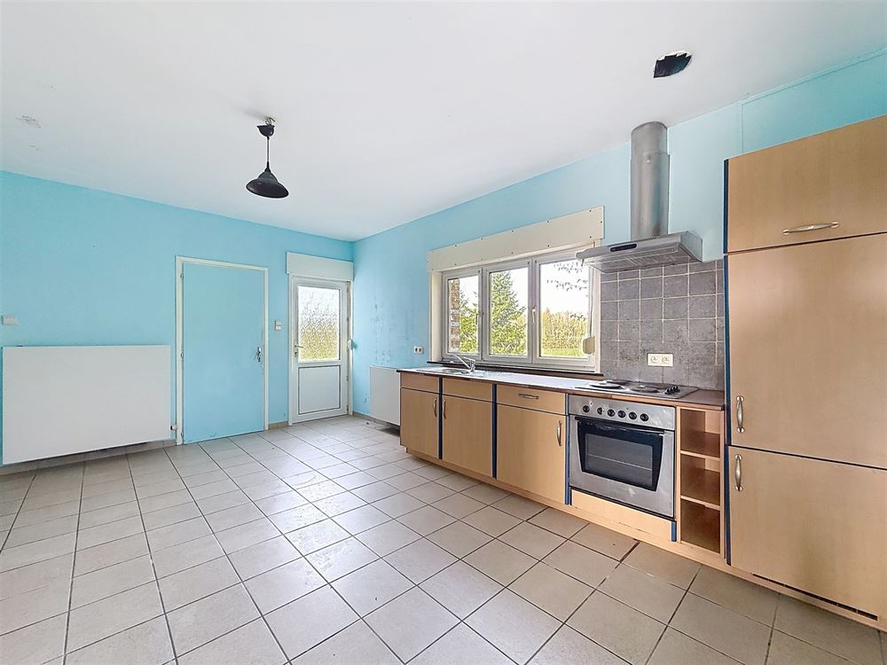 ENSEMBLE DE DEUX HABITATIONS - JARDINS - GARAGES