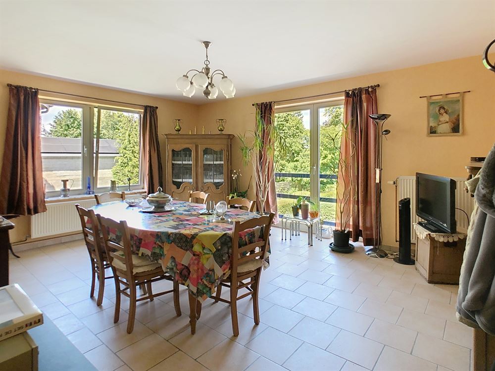 IMMEUBLE DE RAPPORT DE 3 APPARTMENTS ET 5 GARAGES AVEC JARDIN