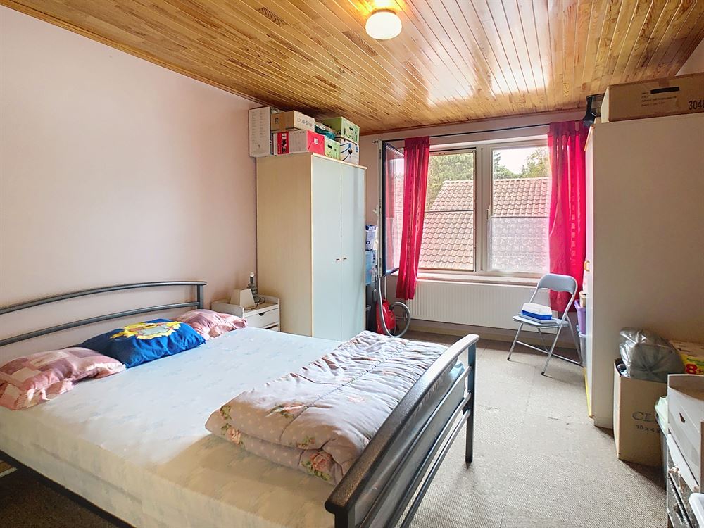 IMMEUBLE DE RAPPORT DE 3 APPARTMENTS ET 5 GARAGES AVEC JARDIN